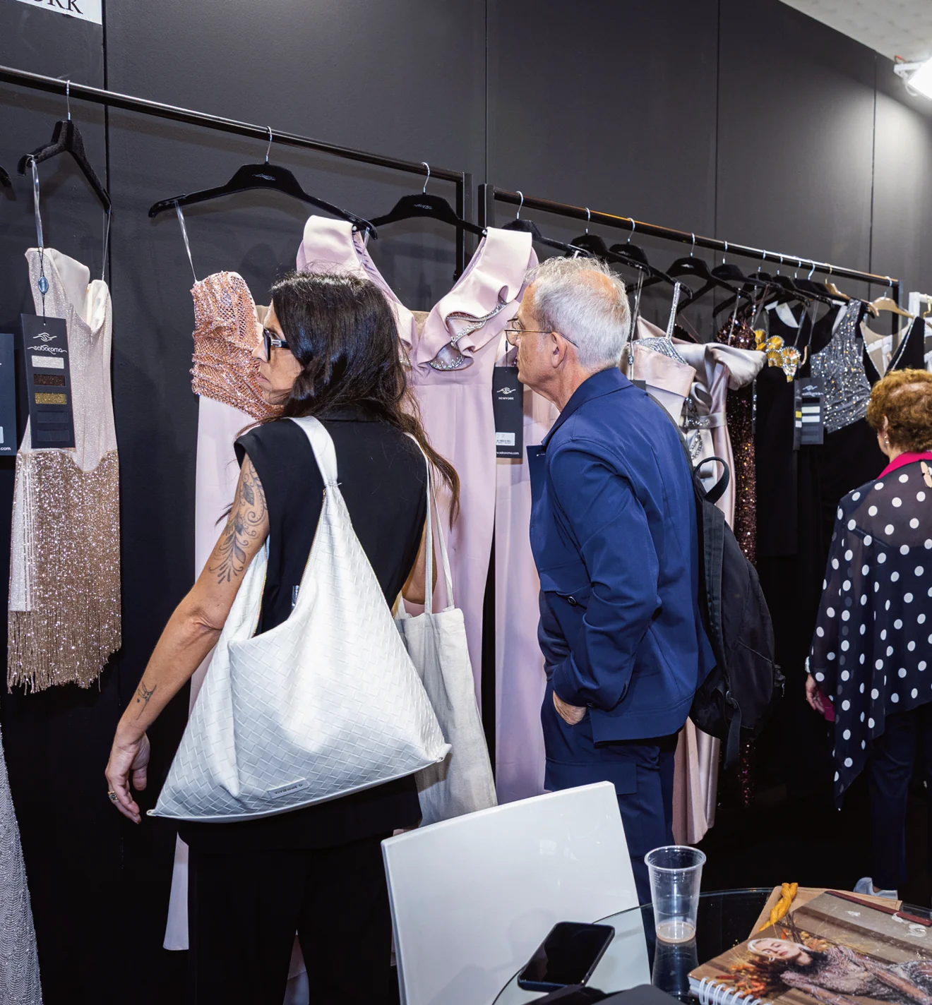 Buyers exploring collections at a MedItaly exhibition